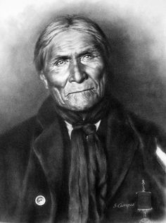 an old black and white photo of a man in a suit with a scarf around his neck