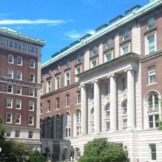 a large building with many windows and columns