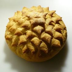 an apple pie sitting on top of a white counter