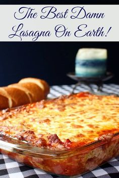 the best damn lasagna on earth is made with cheese and meat in a casserole dish