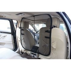 the back seats of a car with an open door