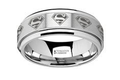 Availability : Ships in 1-2 Business Days  Every once in a while we come across a really cool ring that, though it may not have anything to do with hunting, we just have to offer it. We are also fans of Superman. I remember going to the movies as a kid with my dad to watch Christopher Reeve on screen. Those great memories never go away, and today, Superman is and will always be my favorite superhero. If you or your loved one is a huge Superman fan, or if he's YOUR superman, this ring will not disappoint!    Features of this ring:    Tapered profile with a spinning middle   Hypoallergenic:  Our rings won't cause allergies.  Brush finish  Comfort fit    Properties of Tungsten:    Extremely scratch resistant  Will not bend  Permanently polished  Slightly darker gray color.   Easy to care for! Superman Ring, Going To The Movies, Cool Ring, Christopher Reeve, Dark Grey Color, Ring Sizer, Great Memories, My Dad, Ever After