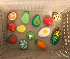 a basket filled with lots of different types of rocks