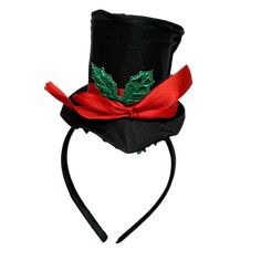 Step into the holiday spirit in style with our festive Top Hat Headband! This delightful accessory is perfect for adding a touch of elegance and fun to your seasonal celebrations. The headband features a mini black top hat adorned with a vibrant red ribbon and a festive green holly leaf embellishment. Whether you’re attending a Christmas party, holiday parades, or simply spreading cheer at home, this charming piece instantly elevates your festive attire. Crafted for comfort, the soft and sturdy Adjustable Holiday Costume Hats, Adjustable Mini Christmas Hats, Adjustable Mini Hats For Christmas Party, Adjustable Headband For Holiday Festivities, Adjustable Mini Hats For Christmas, Holiday Mini Hats With Headband, Holiday Mini Hat Headband, Holiday Headband Mini Hats, Holiday Adjustable Fascinator