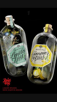 two glass bottles filled with lemons on top of a black background, one is empty