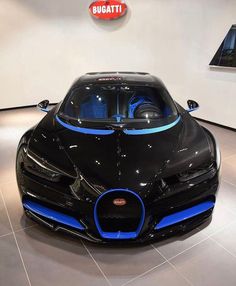 a bugatti car on display in a showroom