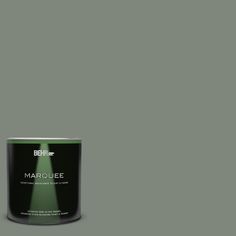 a can of behr marquee green paint