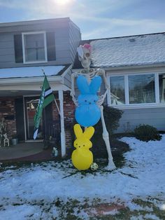 a skeleton is standing in front of a house with balloons attached to it's legs