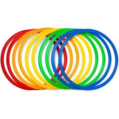 a bunch of different colored frisbees sitting on top of each other