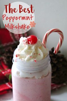 the best peppermint milkshake in a mason jar with candy canes