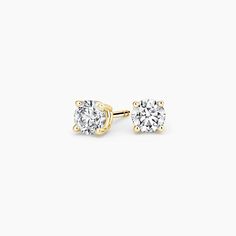 Perfect 4-Prong Diamond Stud Ears (3/4 ct. tw.) - 18K Yellow Gold. Our timeless basket setting maximizes light and sparkle while hugging the diamond on all sides for extra security. Carefully crafted by our experts, this design sits perfectly and never sags or tips.

With unmatched craftsmanship and attention to detail, every aspect of each piece in The Perfect Collection is expertly designed for a look that lasts a lifetime. Round Diamond Stud Earrings, Chalcedony Crystal, Diamond Earrings Studs Round, Yellow Gold Setting, Emerald Earrings, Diamond Stud Earrings, Purple Crystals, Green Gemstones, Diamond Stud