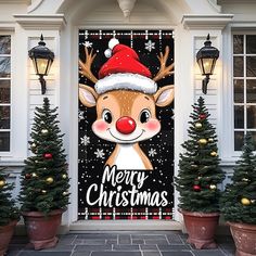 a christmas door cover with a reindeer wearing a santa hat and surrounded by potted trees