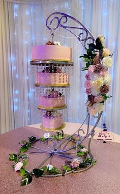 a three tiered cake on top of a table