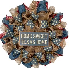 a wreath that says home sweet, texas home with polka dots and burlocks