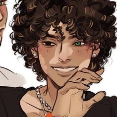 two people with curly hair and green eyes