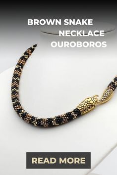 Surprise her with this exquisite brown snake necklace, an ideal gift option. Crafted meticulously using premium Japanese Toho beads, this necklace boasts the highest quality. Its adjustable length makes it suitable for any preference, adding a touch of elegance to any outfit effortlessly. Surprise Her, Necklace Snake, Brown Snake