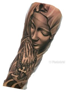 a person with a rosary and cross on their arm is shown in this tattoo design