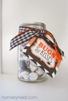 a glass jar filled with chocolate covered candies