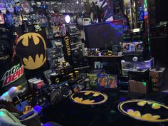 a room filled with lots of batman memorabilia