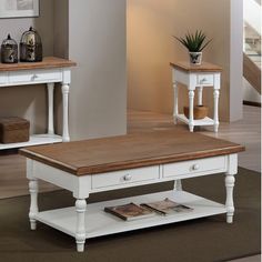 a living room with two end tables and a coffee table