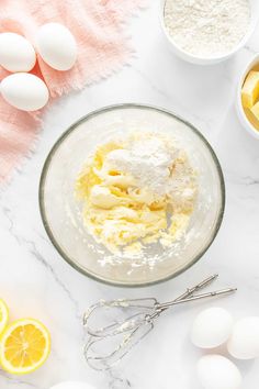 the ingredients for lemon cake are in bowls