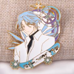 a lapel pin depicting an anime character with blue hair and stars on his collar