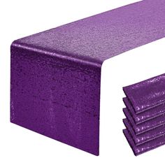 a purple table runner with five place mats