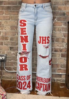 Please message me before purchasing so we can discuss your vision for your custom jeans. I will then let you know which option to choose when checking out! Price is based off of the amount of time it will take me to make your jeans. (price does not include the jeans, only the customization) Senior Jeans Orange And Blue, Spirt Jeans Homecoming, Senior Jeans Red And Black, Custom Senior Jeans, Diy Senior Jeans, Spirit Week Jeans