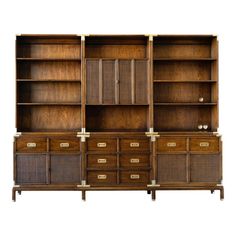 an old wooden bookcase with drawers and doors