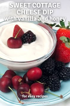 a plate with berries and yogurt on it