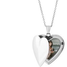 Made of stainless steel, with your choice of silver, gold or rose gold finish. Oval Locket measures 1.2 x 0.9, photo insert measures 0.9 x 0.6. Heart Locket measures 1.07 x 1.09, photo insert measures 0.8 x.85. Engraving available on front side only. Photos already sized and inserted inside. Comes with 18 coordinating chain and gift box. Imported. Personalized in USA Locket Necklace Heart, Oval Locket, Heart Locket Necklace, Jewelry Lockets, Holiday Cards Photo, Whole Heart, Photo Locket, Heart Locket, Birth Announcements