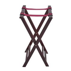 a wooden folding chair with pink straps on it's legs and the seat up