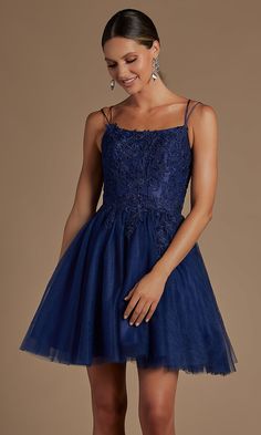 Delightful and sweet, this short homecoming dress has an edgy twist. So cute from the front, this fit-and-flare short party dress has delicate embroidery that flows from the slight scoop neckline, past the natural waist, and onto the full a-line skirt. With every turn, you see a sexy side with double spaghetti straps that flow over the open back before tying into a trendy corset design. Turn up the heat with every spin in this short homecoming dress that is just as alluring for sweet-16 parties, Short Dance Dresses, Purple Hoco Dresses, Purple Hoco, Dresses For Homecoming, Navy Homecoming Dress, Dress With Corset, Mini Homecoming Dresses, Cute Short Dresses, Chic Gowns