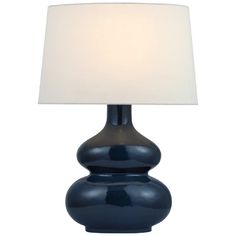 a blue table lamp with a white shade on the top and bottom part of it