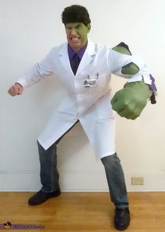 a man in a white lab coat is dressed as the incredible hulk