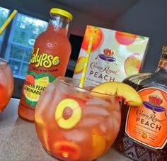 several different types of drinks on a counter