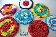 crocheted coasters with different colors and designs