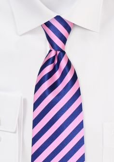 Necktie Product Details:
Handmade from woven microfiber
· Standard length of 58" (XL length also available - see product link below)
· Classic width of 3.1"
· Preppy woven stripes in flamingo pink and classic navy
· Also available as matching pocket squares, skinny ties, and pocket squares
· Looks best with navy and tan jackets/suits
· Shipping weight: 2.0oz Tan Jacket, Flamingo Pink, Bright Pink