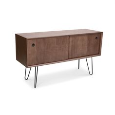 the sideboard is made from wood and has hairpin legs on one leg, and two