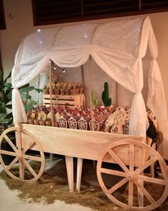 a wooden wagon filled with lots of treats