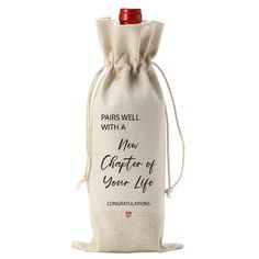 a wine bottle in a bag with the words paris well with a new charter of your life printed on it