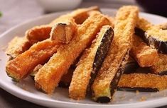 some fried food is on a white plate