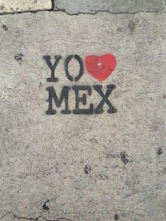 graffiti on the sidewalk that says yo mex with a red heart in the center