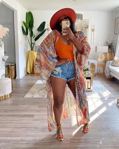 Size (in) Bust Length S 57.9  56.3  M 59.4  56.7  L 61.0  57.1  XL 62.6  57.5  2XL 64.2  57.9  Multi Color Kimono for everyday casual use, beachwear or pair it up with a cute pair of jeans or shorts and add the finishing touches of a high heel or sandal. All eyes on you as you float across the room or resort on this beauty. Multi color printed duster with oversized sleeves Wear as a swimsuit cover up or over jeans and a tank. Mixed print, open front long kimono Loose fit Animal Print Kimono, Looks Jeans, Fest Outfits, Sunset Boulevard, Vacay Outfits, Looks Street Style, Trendy Fashion Outfits, Print Kimonos, 1st Anniversary