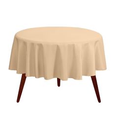 a round table covered in a beige cloth with wooden legs and an oval shaped top