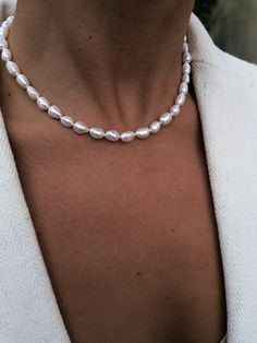 "Beautiful white baroque pearls hand knotted with 100% silk  Necklace is suitable for everyday wear thanks to smart PVD gold plated stainless steel - the gold colour does not tarnish Adjustable lenght 41,5 - 46,5 cm =  16\" - 18\" (for custom lenght write me a message first) Freshwater pearls are perfect accessory for any occasion You will recieve your bracelet nicely packed in our brand box - ready to be gifted or to be stored in" Elegant Everyday Beaded Pearl Necklace, Classic Beaded Baroque Pearl Jewelry, Adjustable Baroque Pearl Jewelry In Pearl White, Minimalist Handmade Pearl White Necklace, Everyday White Single Strand Pearl Necklace, Minimalist Single Strand Baroque Pearl Necklace, Elegant Handmade Beaded Necklaces, Gift Pearl Necklace With Round Beads, Adjustable White Pearl Necklace For Everyday