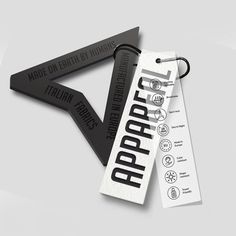 two black and white bookmarks with the words utopia written on them are laying next to each other