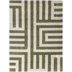 a green and white rug with an abstract design on the bottom, in front of a white background