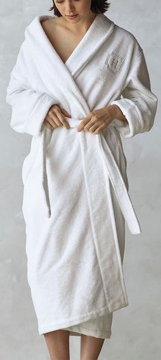 For a skin-pampering indulgence that rivals a day at the spa, wrap yourself in our ultra-soft robe. The robe features a plush 280 gsm in luxuriously absorbent Turkish cotton and an ultra poly-fleece exterior for sumptuous warmth and relaxation après shower. Woven in a soft cotton blend, our Resort Plush Slippers are a perfect match. Long Sleeve Cotton Robe For Wellness, Cozy White Robe For Relaxation, White Cozy Sleep Robe, Cozy White Sleep Robe, White Long Sleeve Bathrobe, White Long Sleeve Bath Robe, Cotton Long Sleeve Robe For Spa, Long Sleeve Cotton Spa Robe, Long Sleeve Cotton Robe For Spa