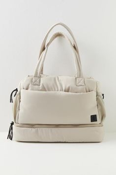 Your new go-to bag for all things active and beyond, this essential duffle from FP Movement is featured in our signature puffy ripstop fabrication with endless pockets for a true do-it-all bag.Height: 13 in Length: 16 in Depth: 6 in100% Polyester    Machine wash cold Free People Activewear, Workout Essentials, Free People Movement, Essential Bag, Fp Movement, Sneaker Heels, Personalized Accessories, Duffel Bag, Accessories Shop